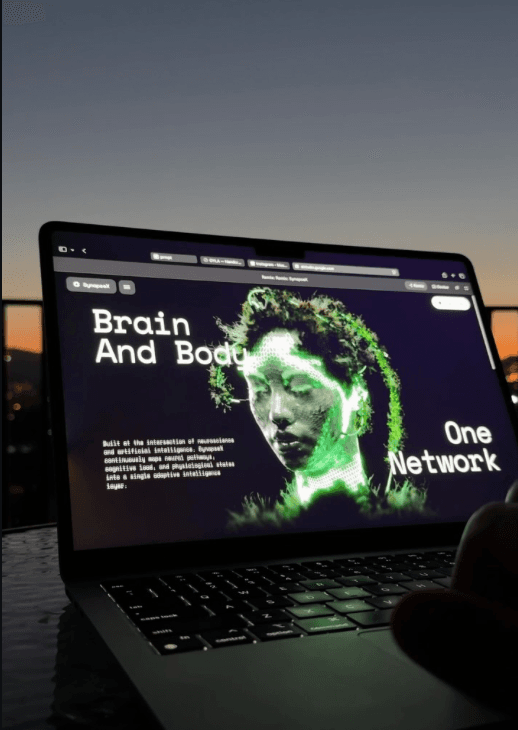 "Brain and body, one network" AI startup post on a laptop screen